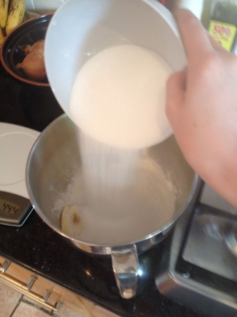 Put the sugar, flour and butter into the electric mixer.