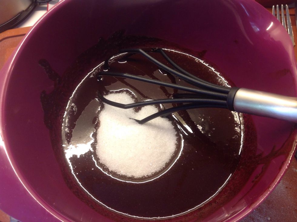 Put the sugar in and stir it around.