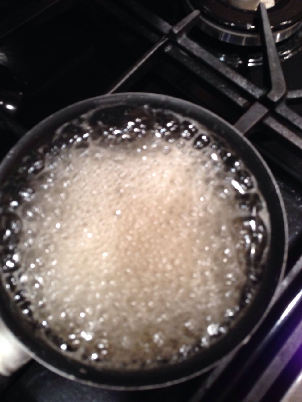 Put the syrup ingredients into a pan and bring to a fast rolling boil. Leave to cool then pour the syrup carefully and equally over each of the cooled sponges