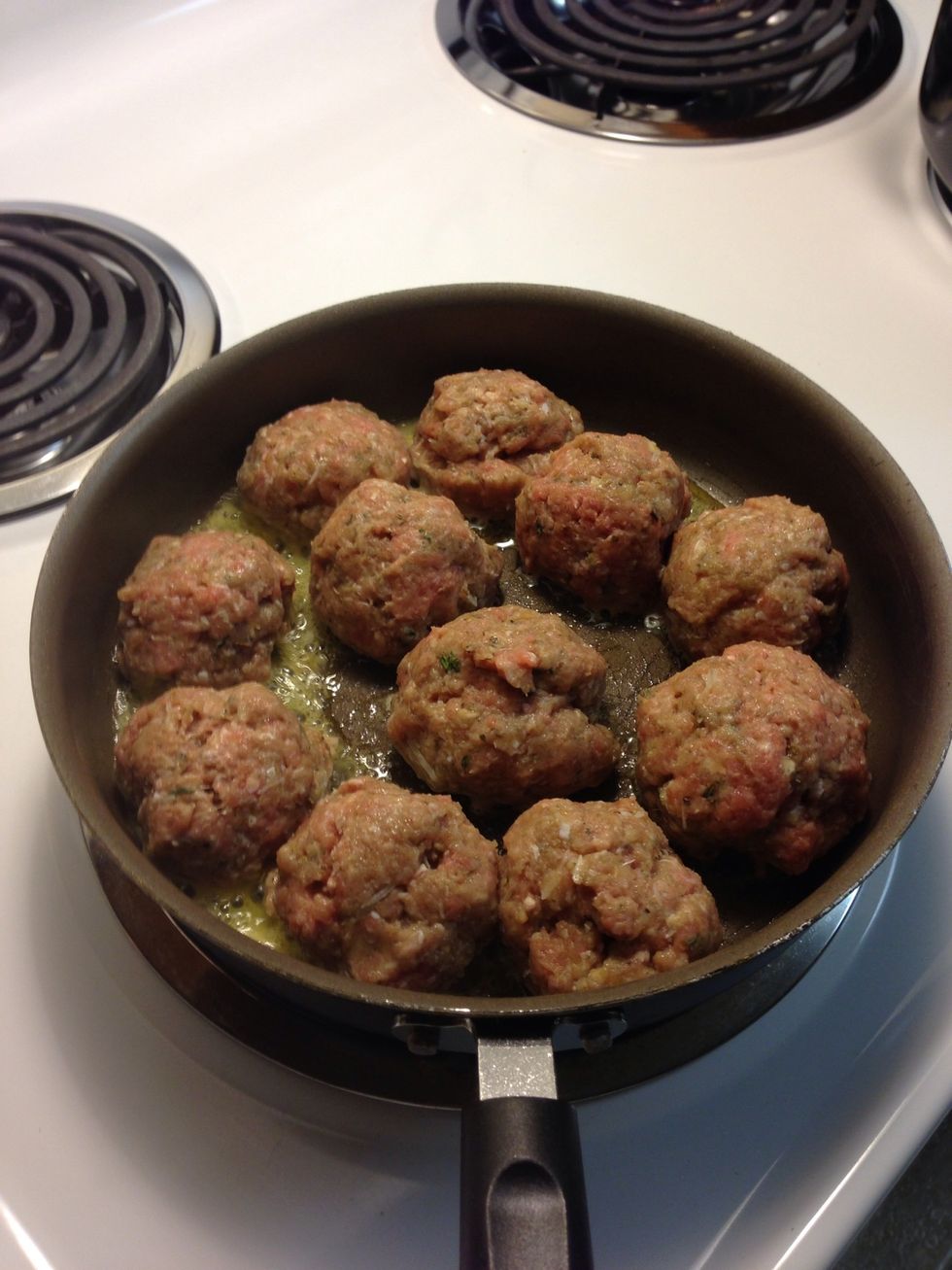 Put the temp on medium and place the meatball in the pan