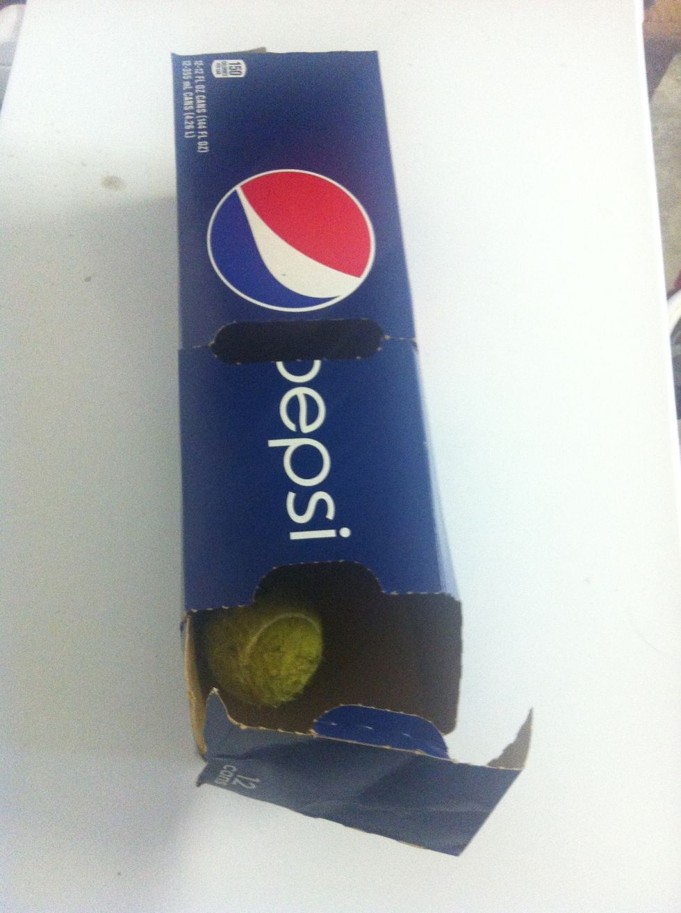 Put the tennis ball on the soda box aaaand...
