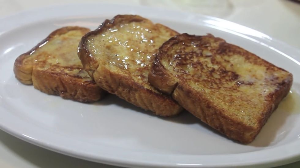 Put the toast on a plate,then serve immediately with syrup and other toppings if desired