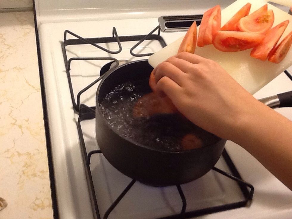 Put the tomatoes in the water