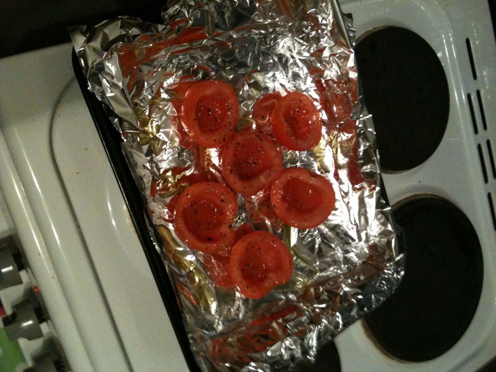 Put the toms open side up on a tinfoiled baking tray and season with whatever you like, I used mixed Italian herbs, garlic salt and pepper, drizzle on some extra virgin olive oil. In the oven on med.