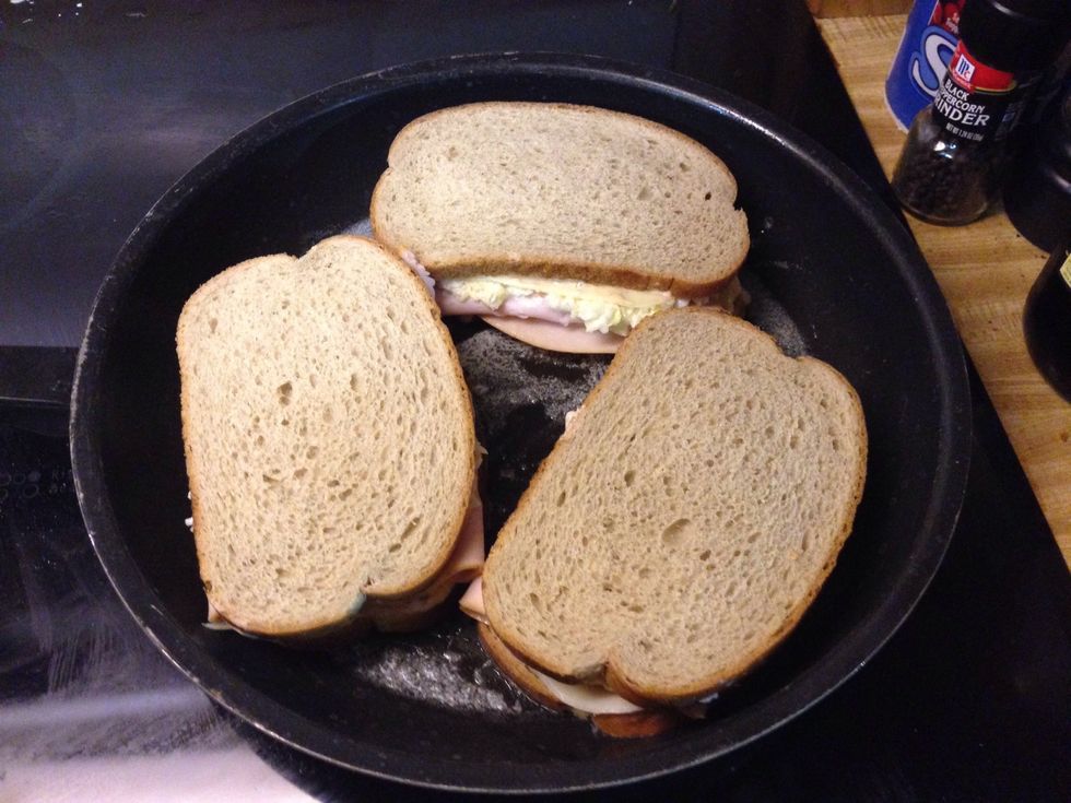 Put the top on the sandwich and carefully place the sandwiches in the pan to cook. You may want to do 2 at a time but since I only needed 3 I could do them all at once.