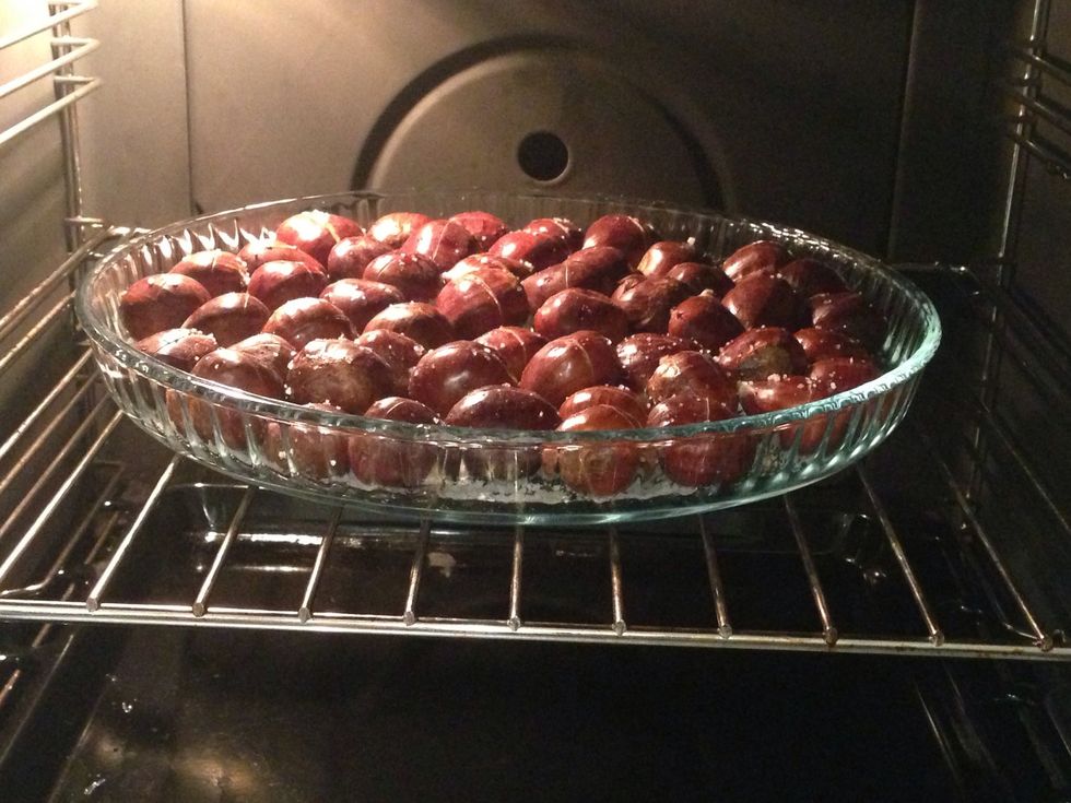 Put the tray with the chestnuts in a preheated oven at 200\u00baC ( 392 degrees Fahrenheit) for about 30 minutes.