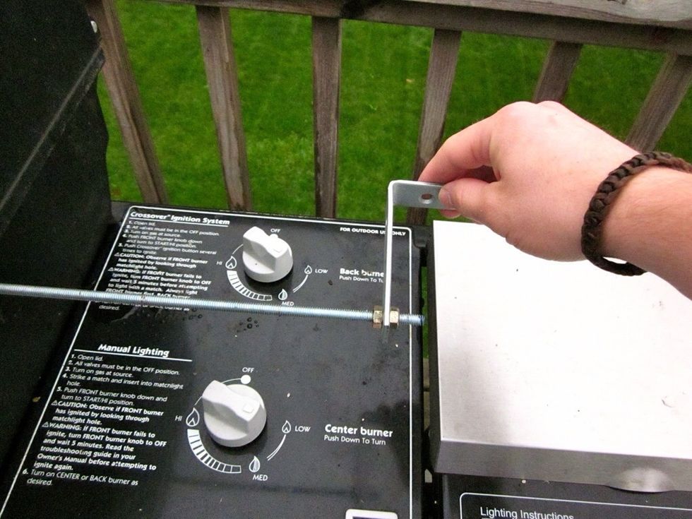 Put the tumbler in the grill and begin to rotate slowly.