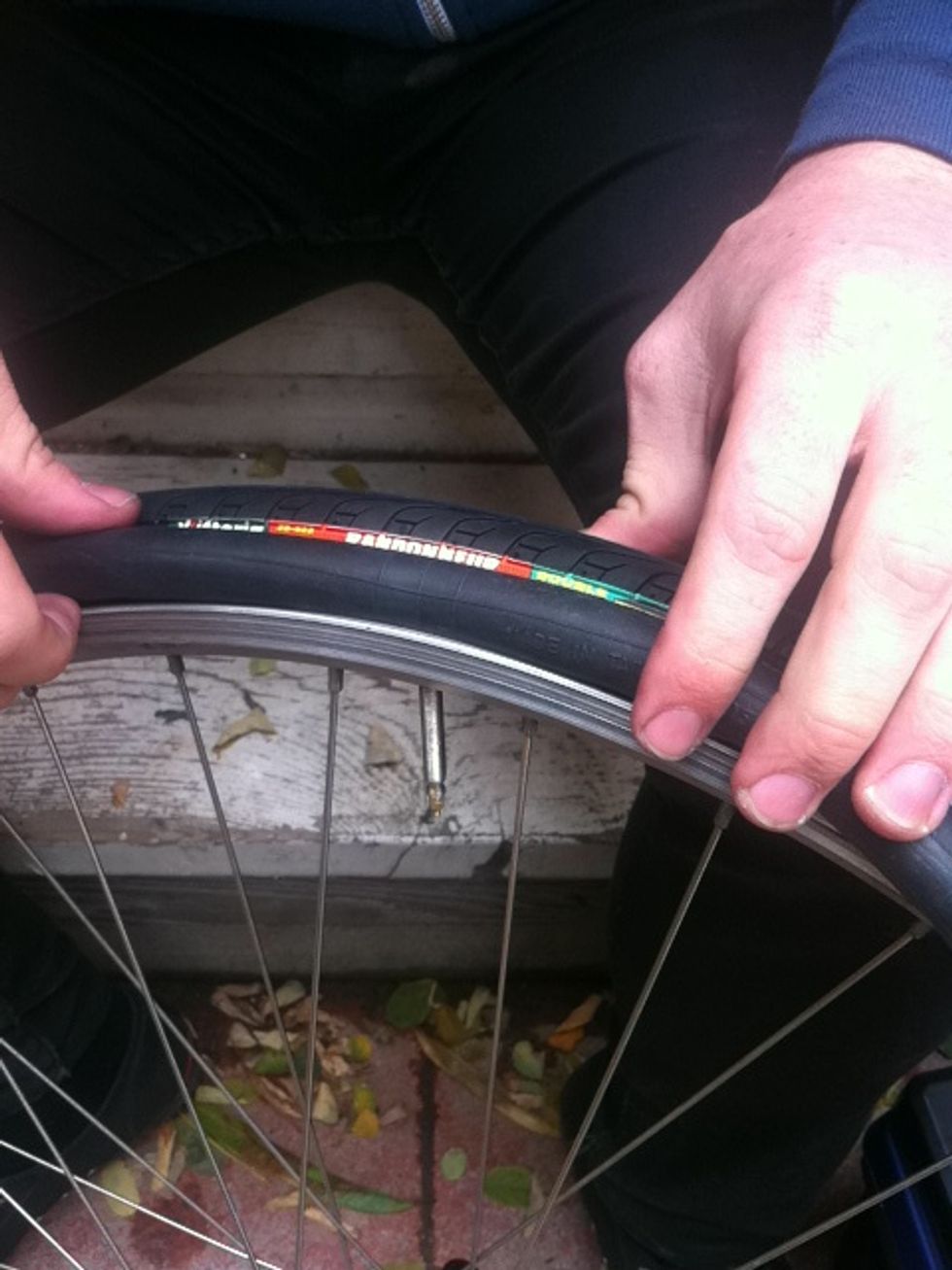 put the valve of the tube through the valve hole