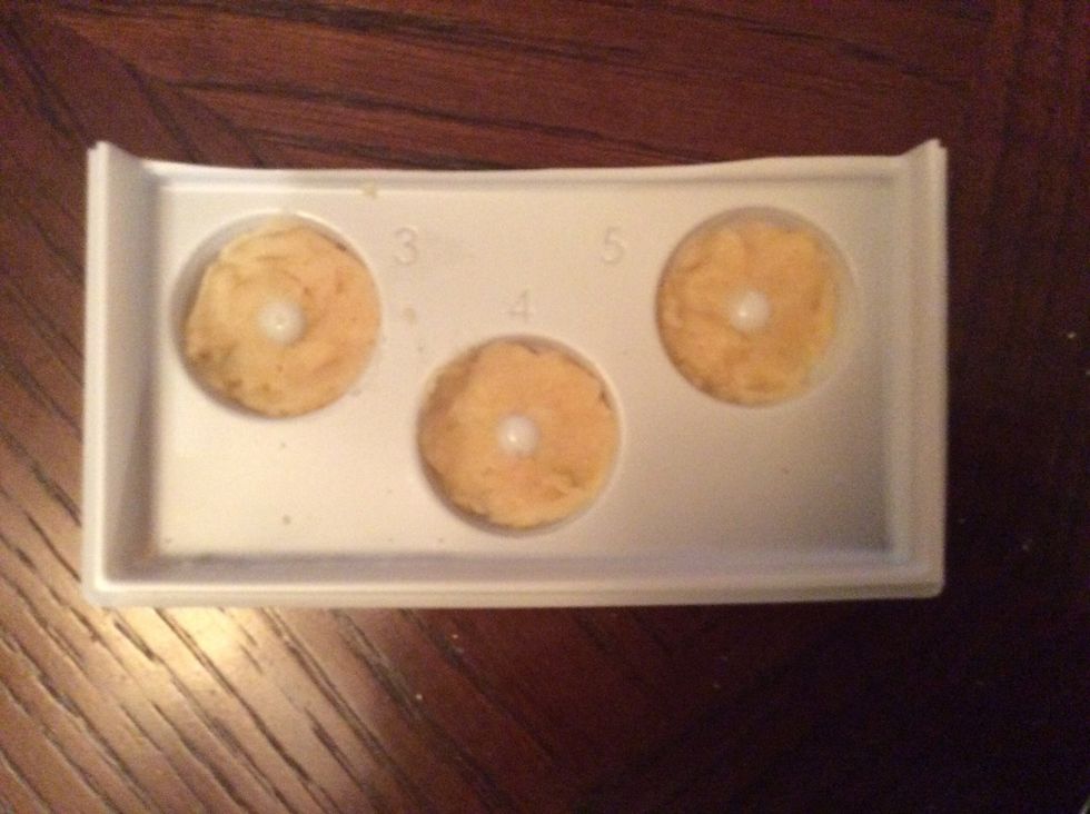 Put the vanilla dough in the donut shaped tray.\ud83c\udf69