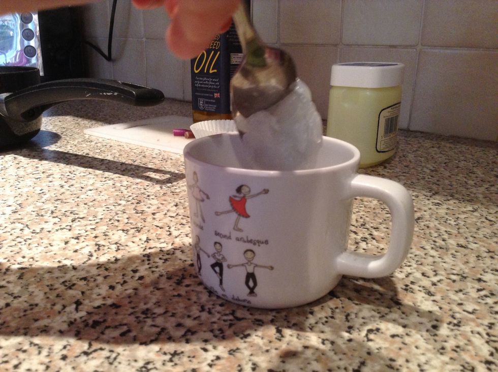Put the vasaeline in to a small cup