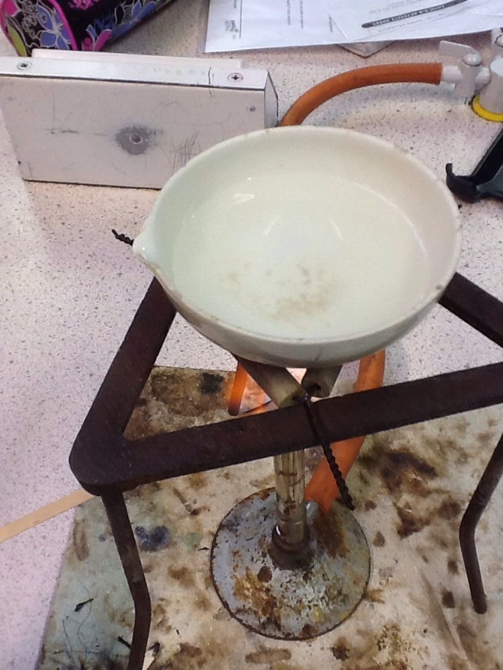 Put the water in the evaporating basin.