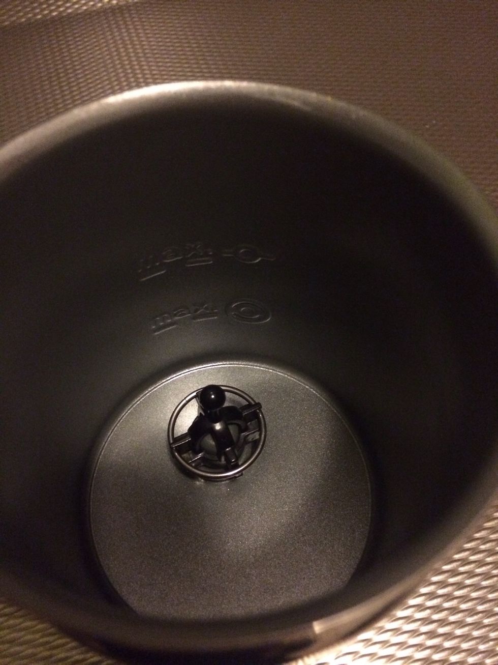 Put the wheel into your milk frother. Make sure to remove the foaming part that you would use to make a cappuccino.