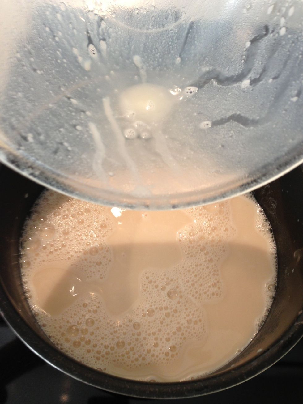 Put the whole mix back in the cooking pot and on medium heat. Stir constantly untill the desired thickness.  1 or  2 mins. Add the miskeh. (Mastic)