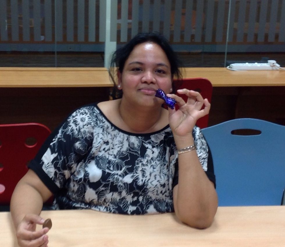 Put the wrapper in your mouth