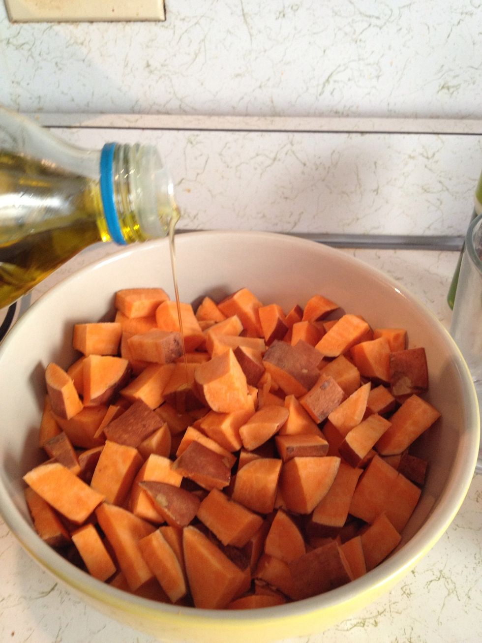 Put them all in a big bowl and drizzle with olive oil. Don't use to much, but I like mine fully and generously covered.