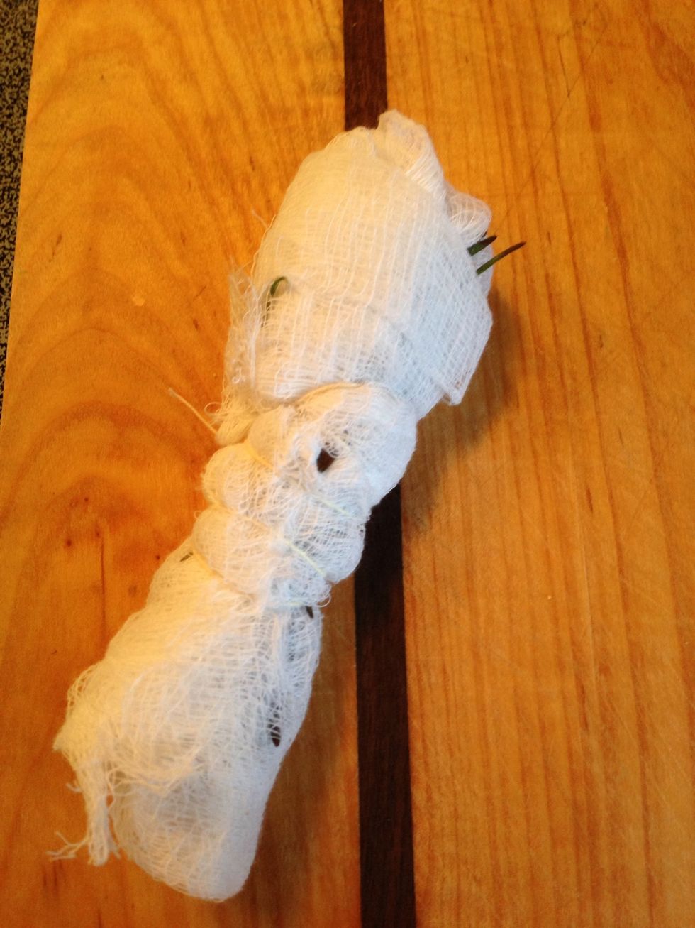Put them all in cheesecloth then tie with kitchen twine, put off to the side