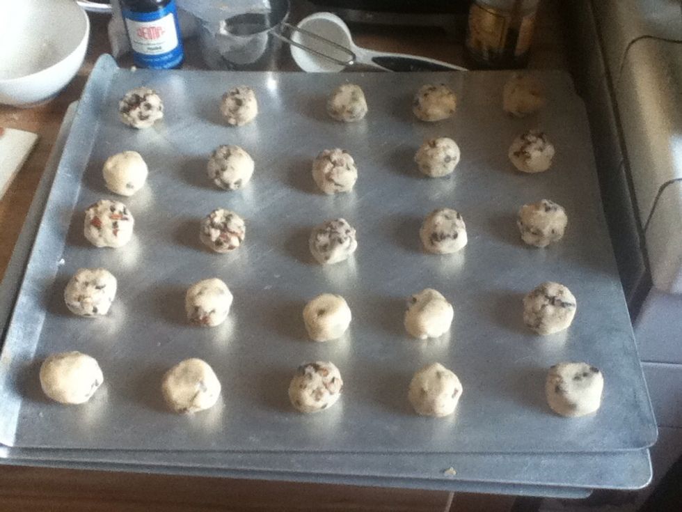 Put them in an ungreased sheet pan and don't worry for the space put as many as they fit since they won't expand. Bake for 12 minutes