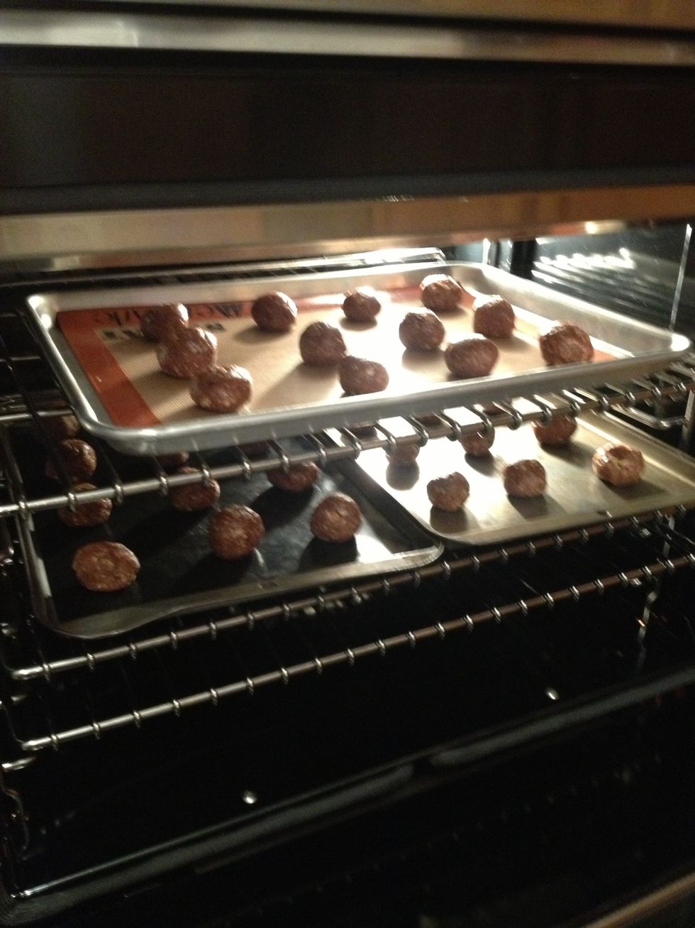 Put them in the oven for about 10 mins. You can poke them to see I they are done but remember the chocolate inside will be melted