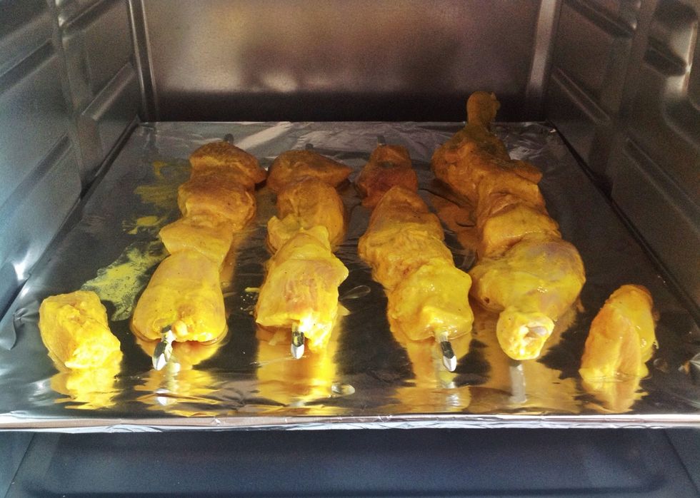 Put them in the oven. Put about a teaspoon of Olive Oil over the pieces. (The aluminium foil is put around the tray to keep it clean)