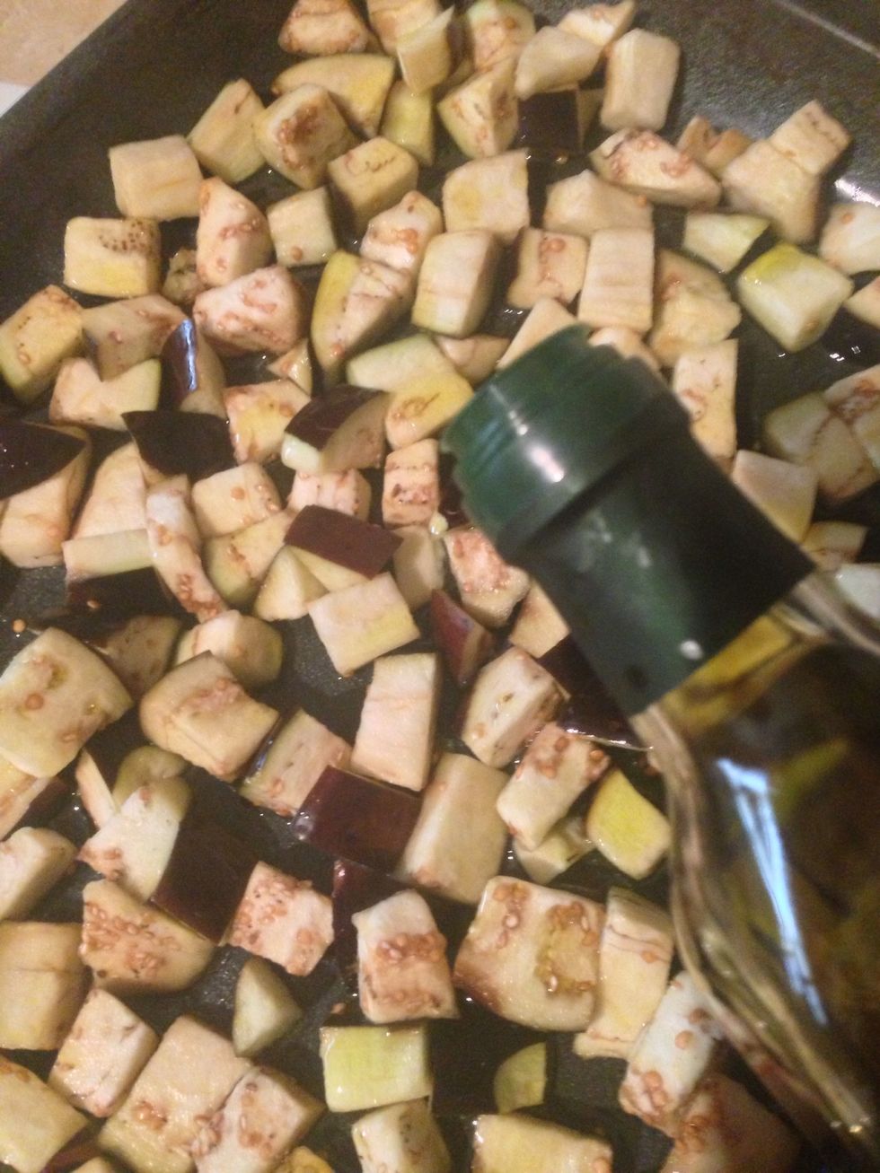 Put them in the oven tray and pour some olive oil over it, broil in the oven till you get lovely golden color eggplants.