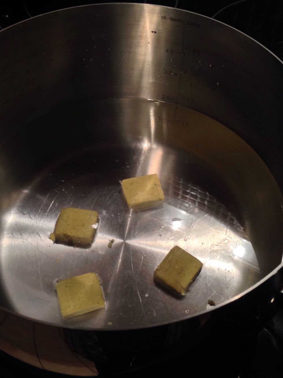 Put them into a big pot and top them with 1.5 liter of filtered water. Put the gas on max and leave to boil.