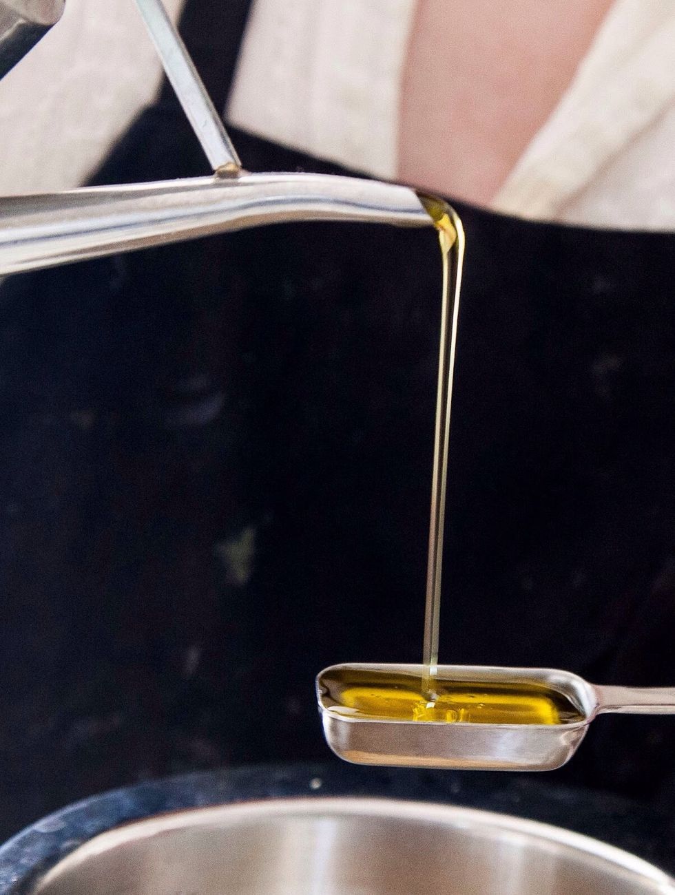 Put them into a bowl and add the olive oil...