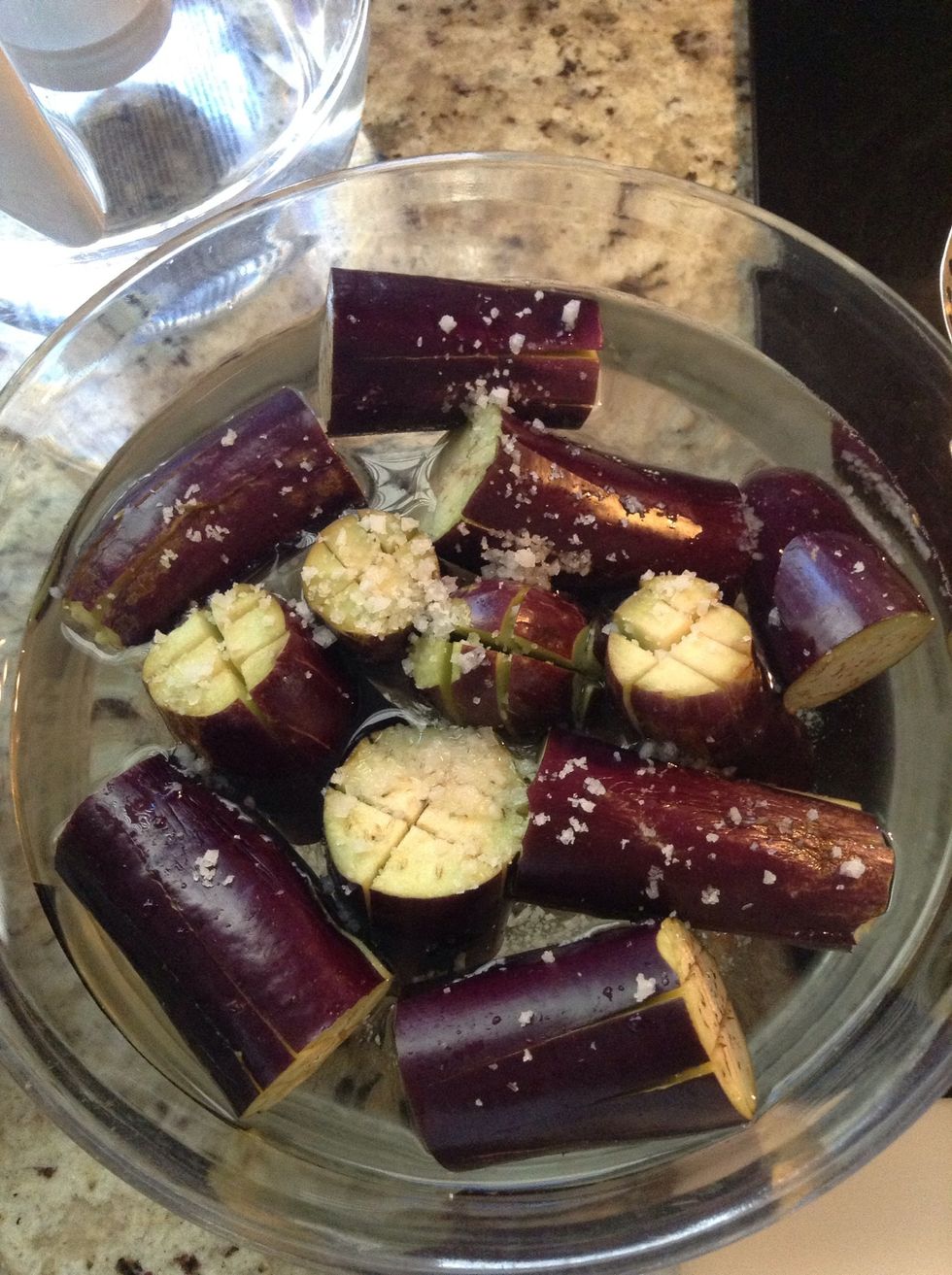 Put them into a bowl covered in water. Sprinkle salt.