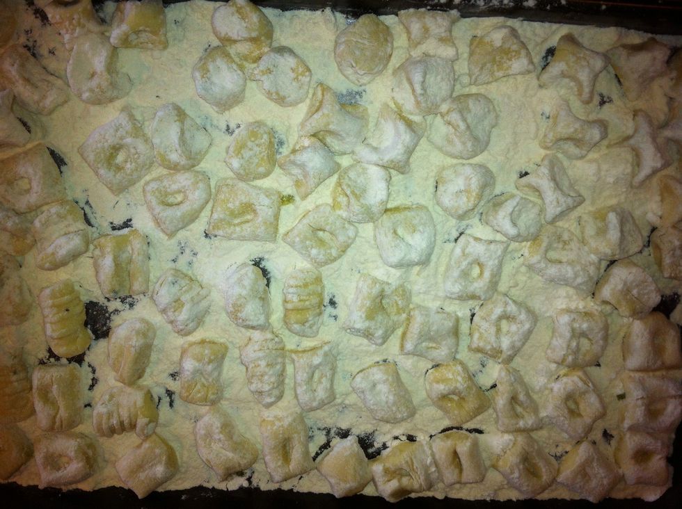 Put them on a tray not touching each other. This is when you can freeze them. Just place the tray in the freezer, when frozen shake off excess flour and put in a bag! See tips for cooking.