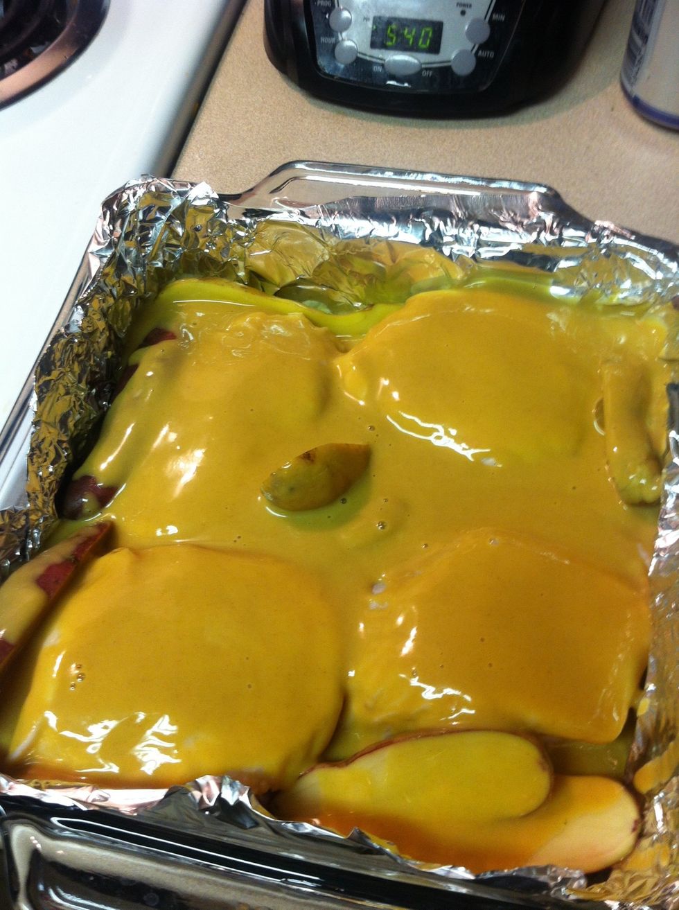 Put thighs/whatever part you want in pan with potatoes. I used 8X8. Season chicken with salt & pepper. Pour sauce over everything. Cook 40 m or until 165 F. Halfway through spoon sauce over chicken