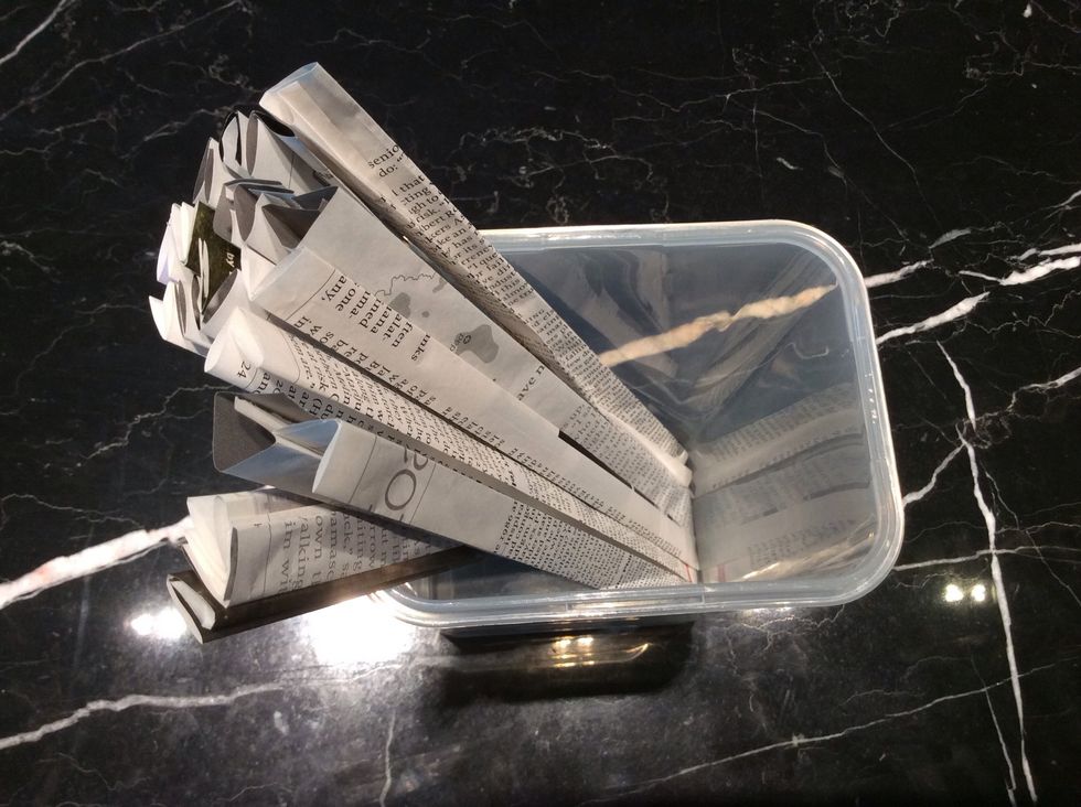 Put this into a container as well. Don't mind the pasta container I'm using! This makes it easy to reach and also, so you don't lose it when a big puff of wind comes blowing in.