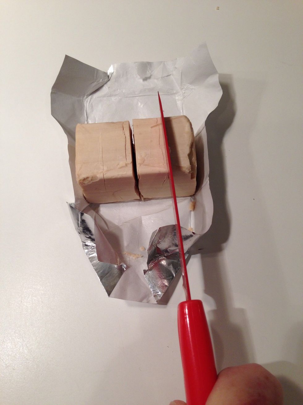 Put this much yeast (1/4 of 2 oz package or, 1/2 oz. if you had a scale) into the tub.