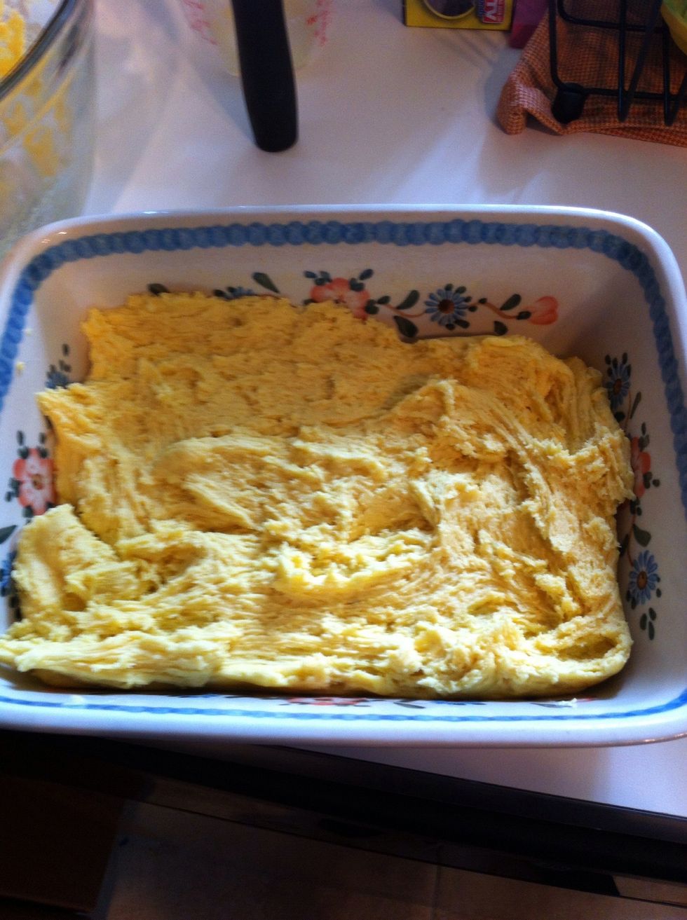 Put tht mixture in a 9 inch greased baking dish