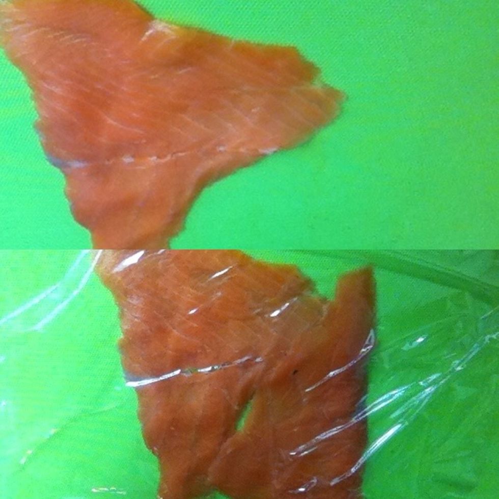 Put to piece of smoke salmon together and put cling wrap on top