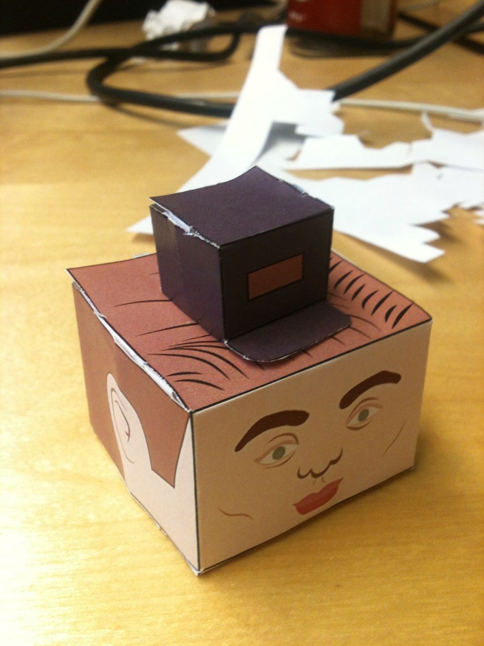Put together the cap and the head.
