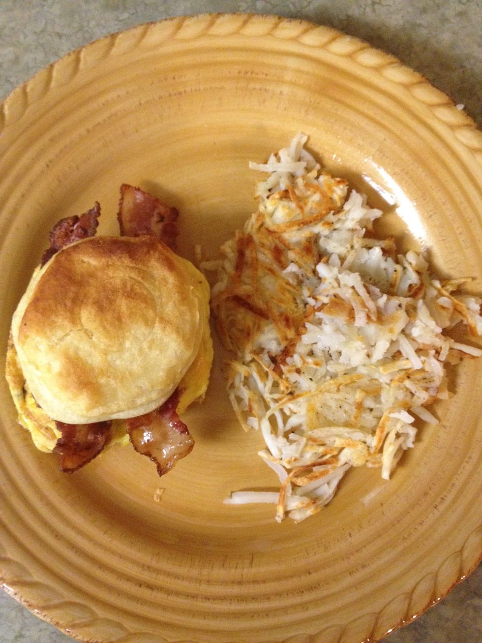 put together your sandwich (bacon, eggs, cheese, and biscuits.) serve with hash browns...