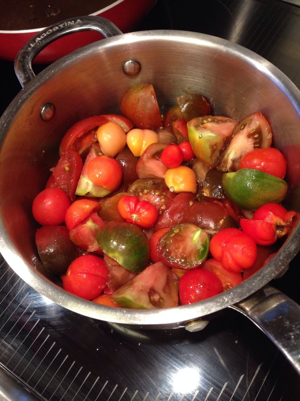 Put tomatoes in a large saucepan and put in the stock