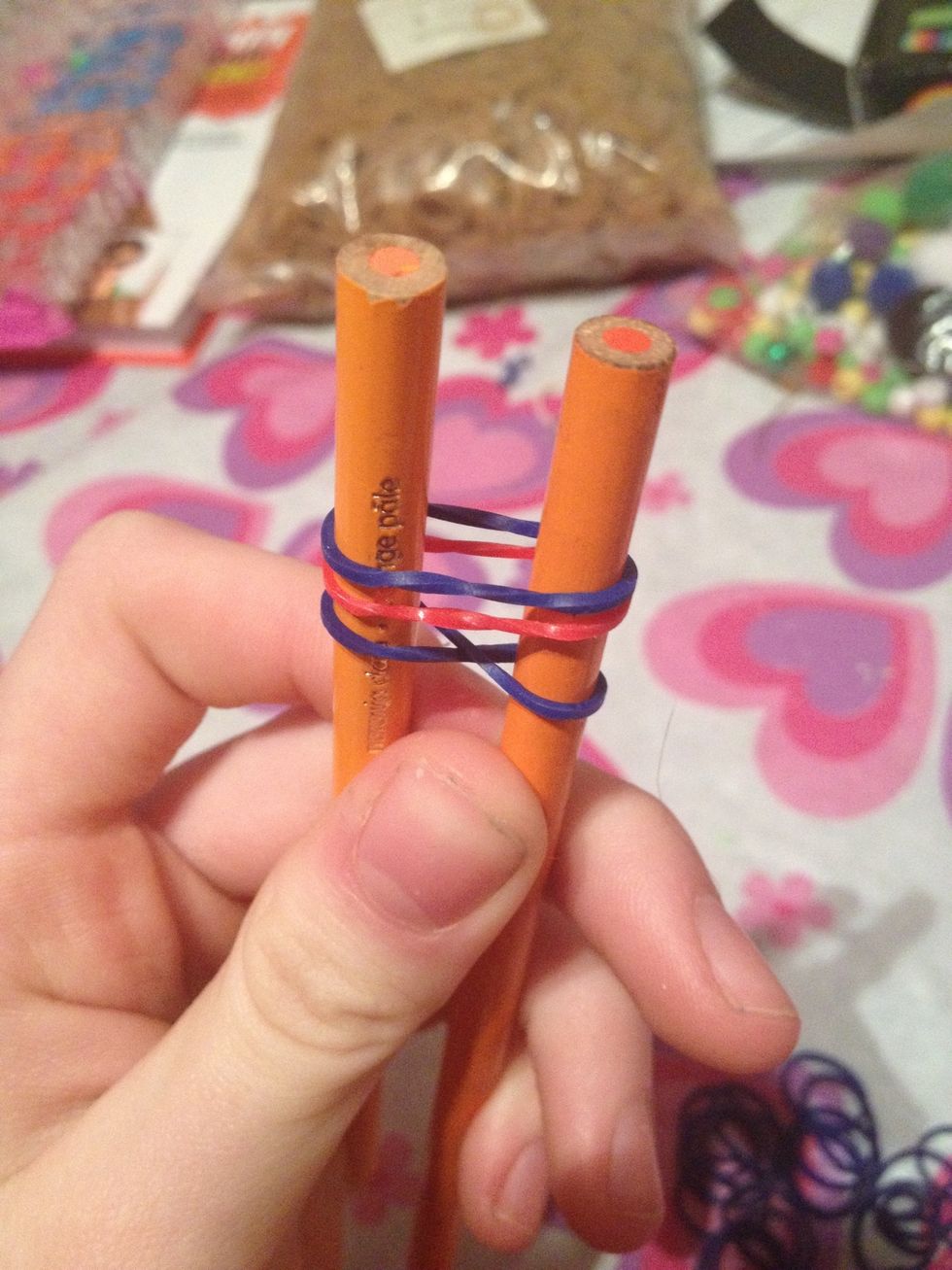 Put two more elastics over top normally