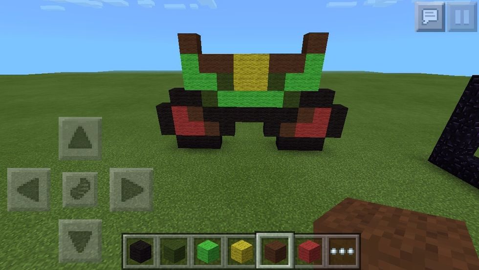 Put two yellows on top if the other yellows, full the gap with browns and place one brown on top of each 'L'.