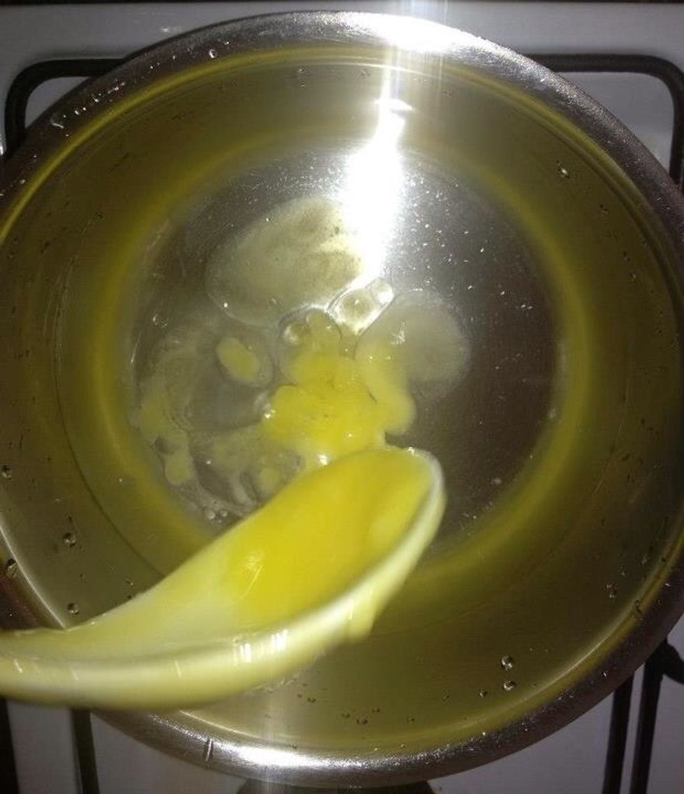 Put water in a saucepan and then place the margarine