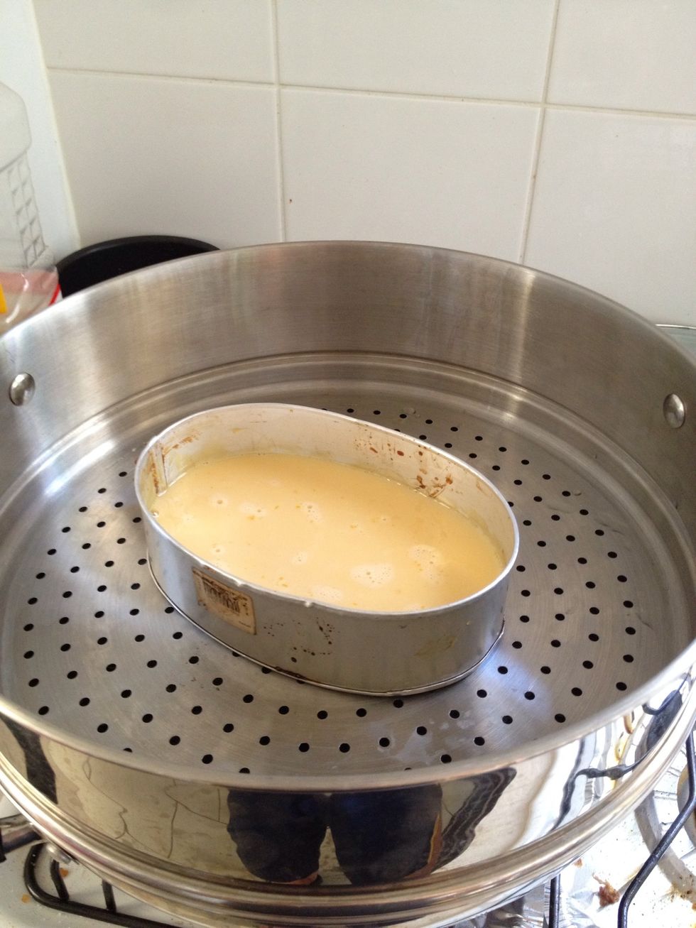 put water in the steamer. cover mix with foil. place in steamer and steam for ~25-30 mins