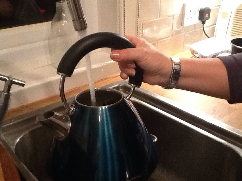 Put water into a kettle.