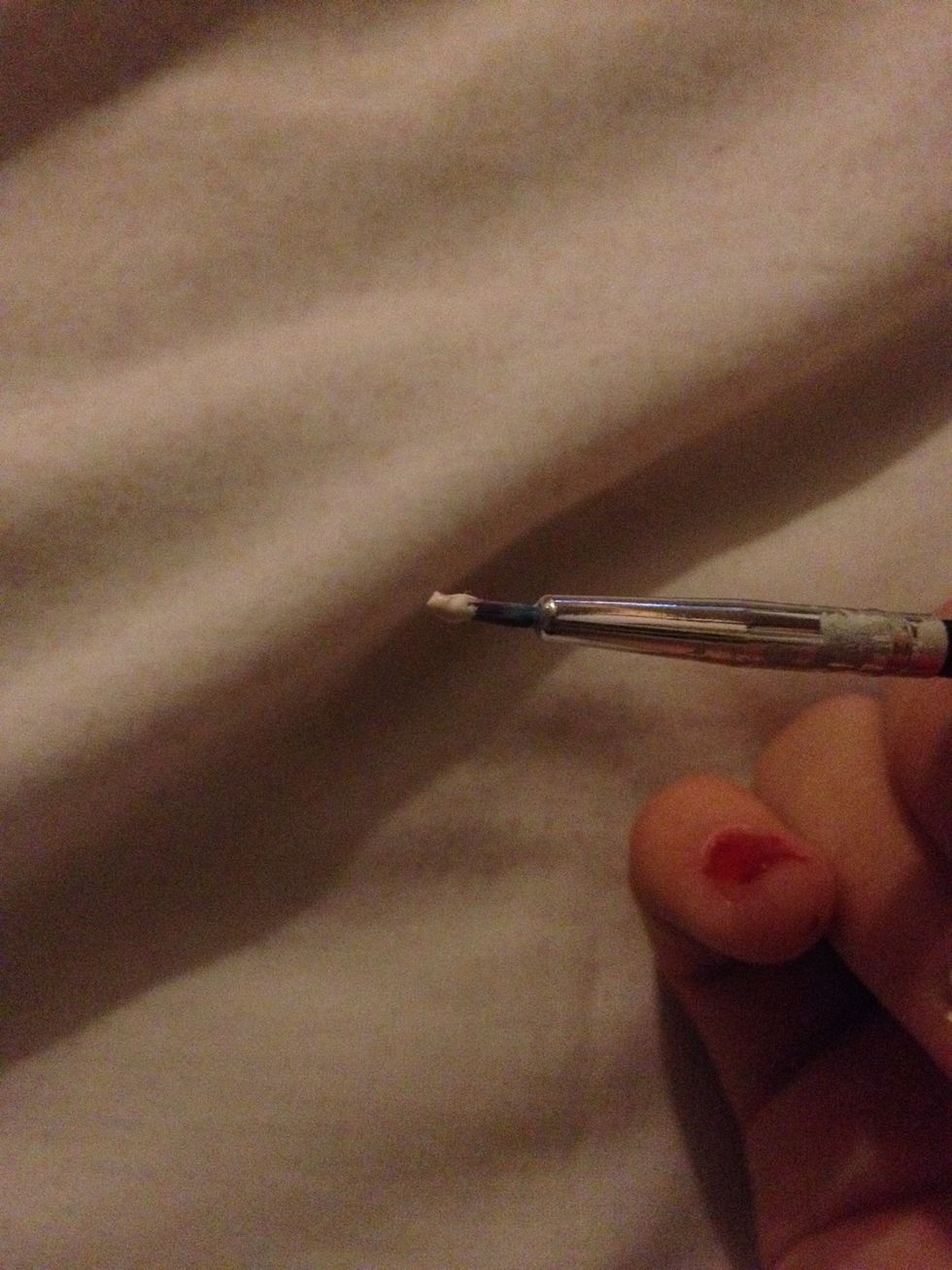 Put white nail polish on your dot tool