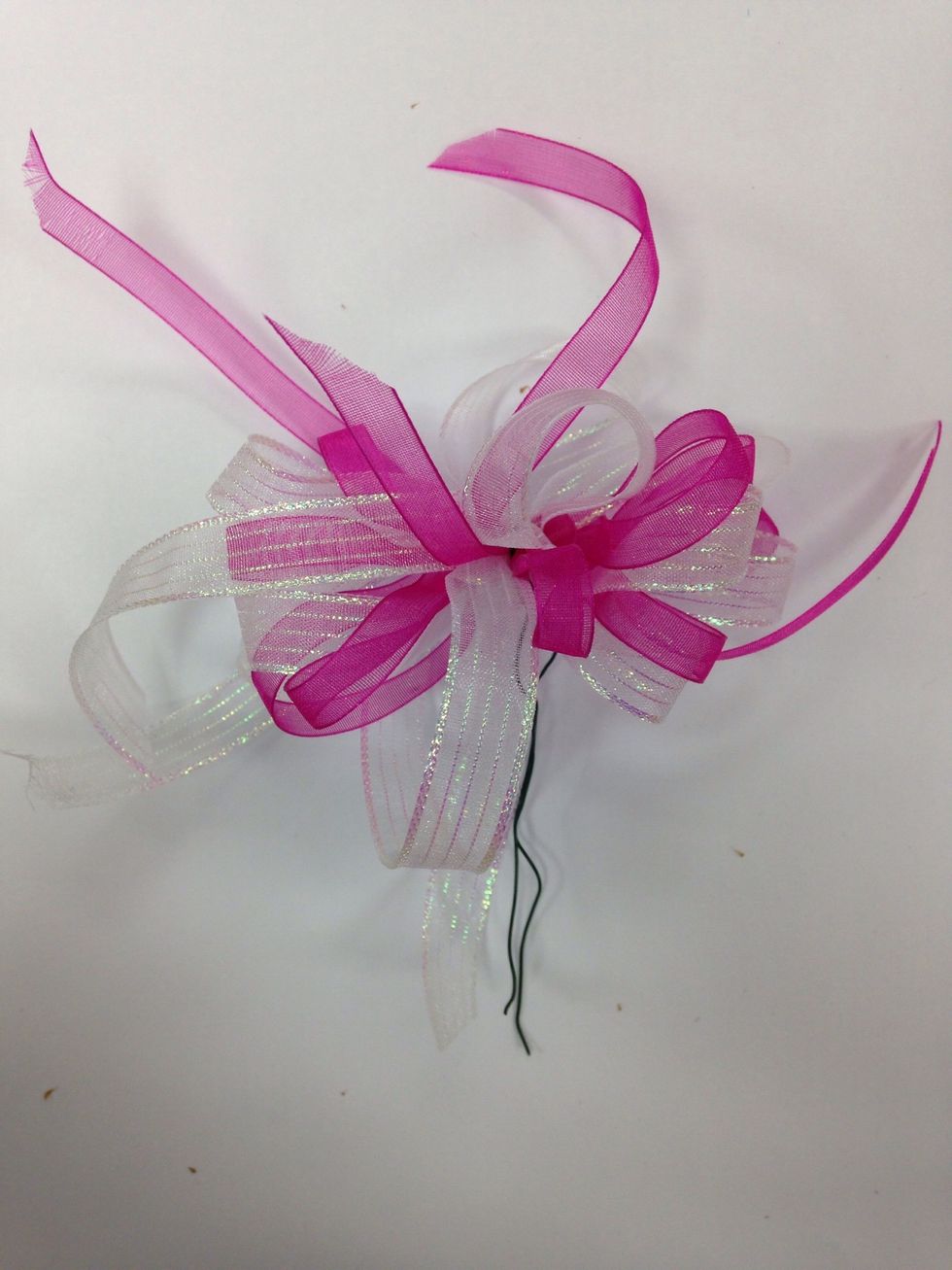 Put wire around center of bow to keep it together.