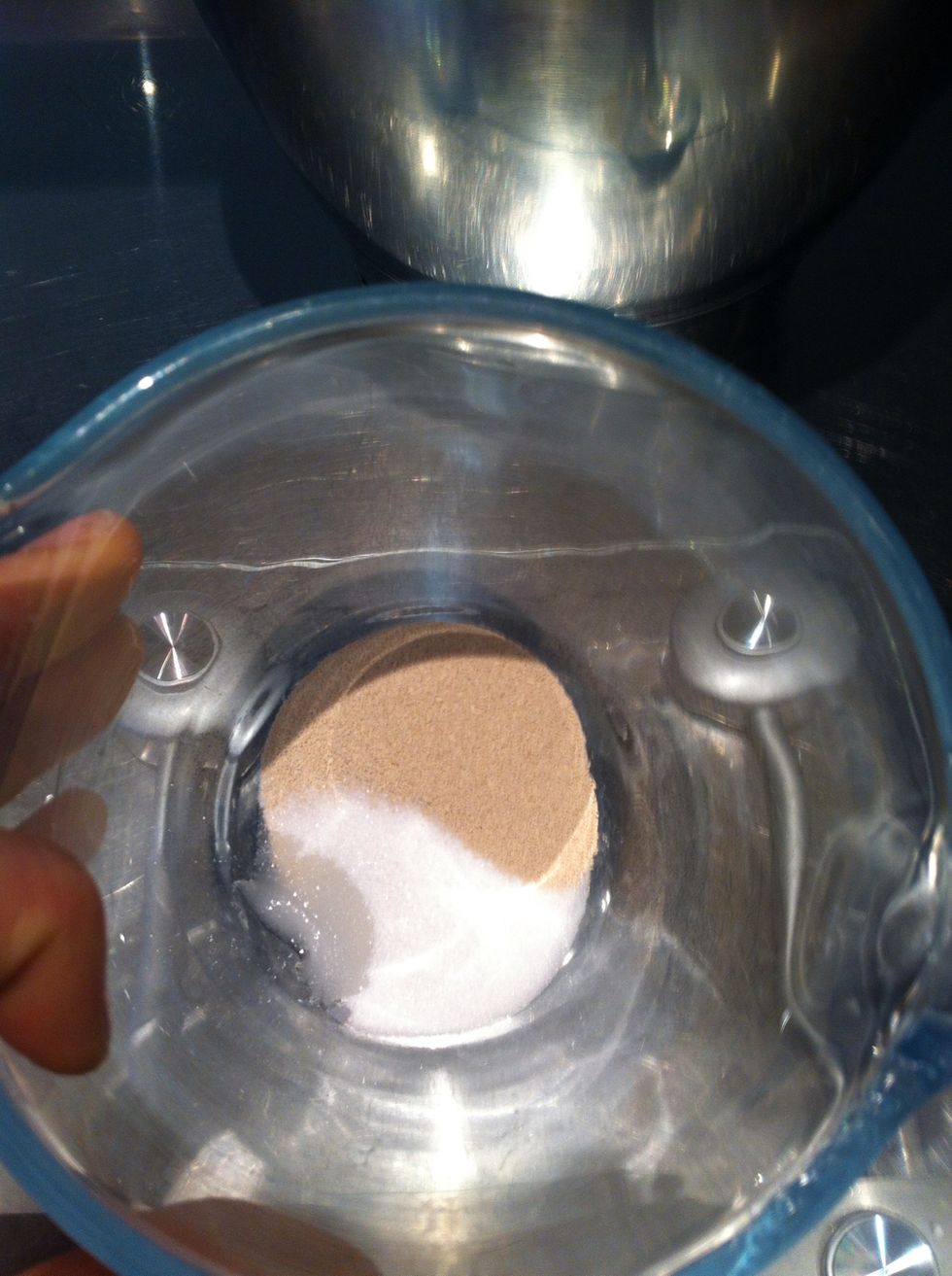 Put yeast and sugar in a jug.