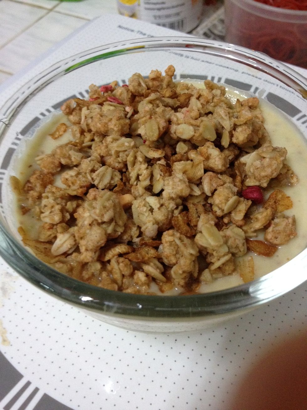 put yogurt in the cup with musli topping