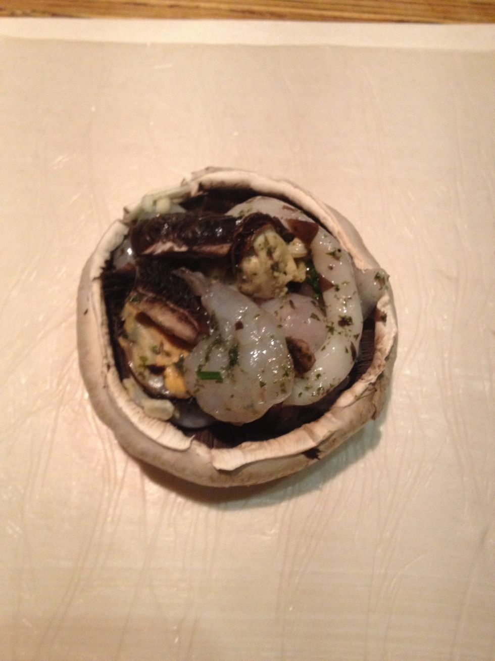 Put you mushroom in the middle of your pastries then spoon in your Seafood marinara