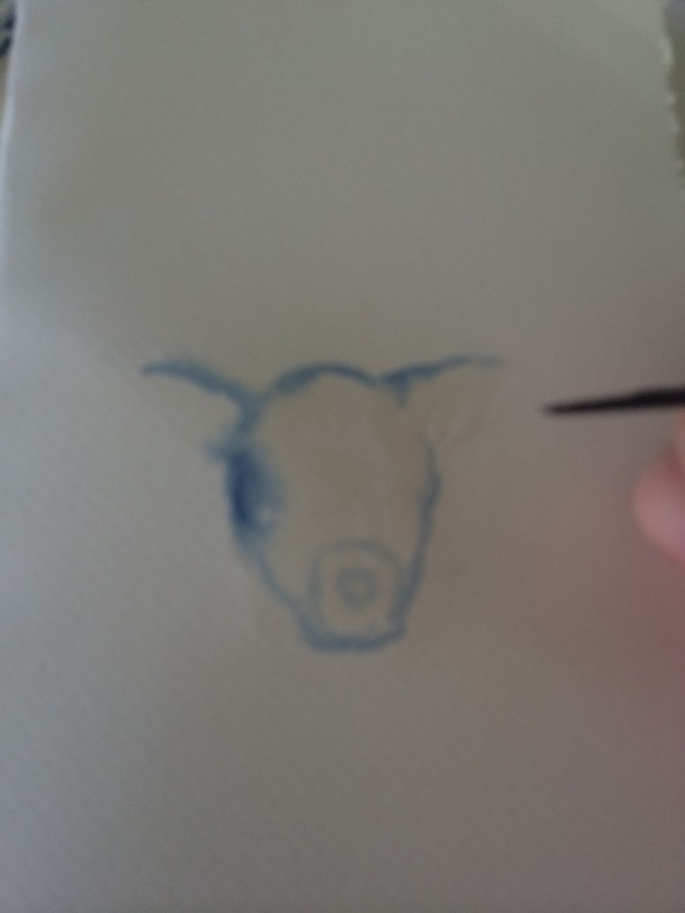 Put your base colour around the edges of the deer head and outline the nose