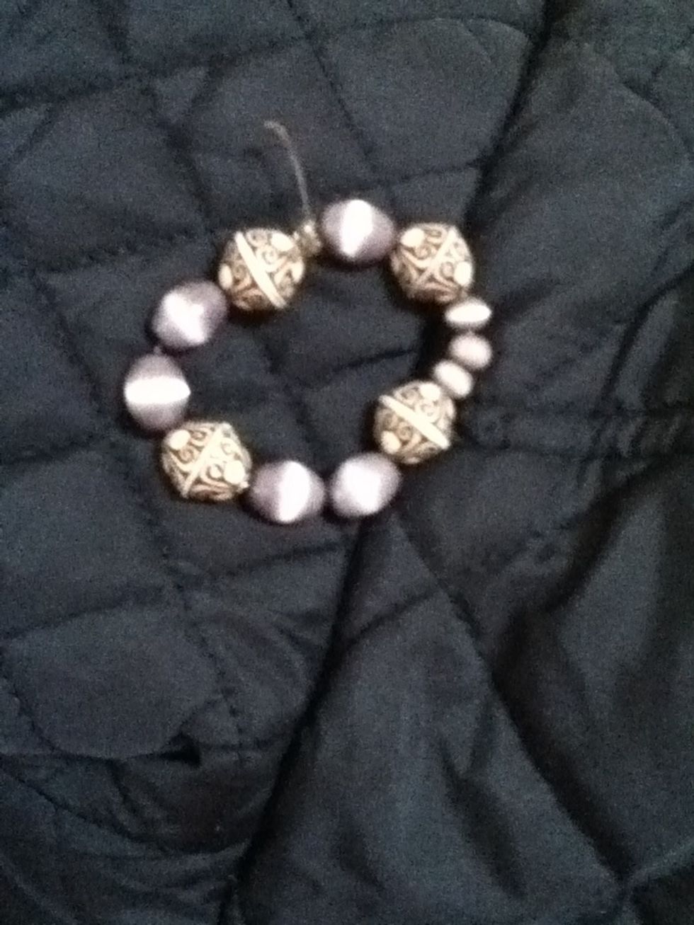 Put your beads on and then tie two knots