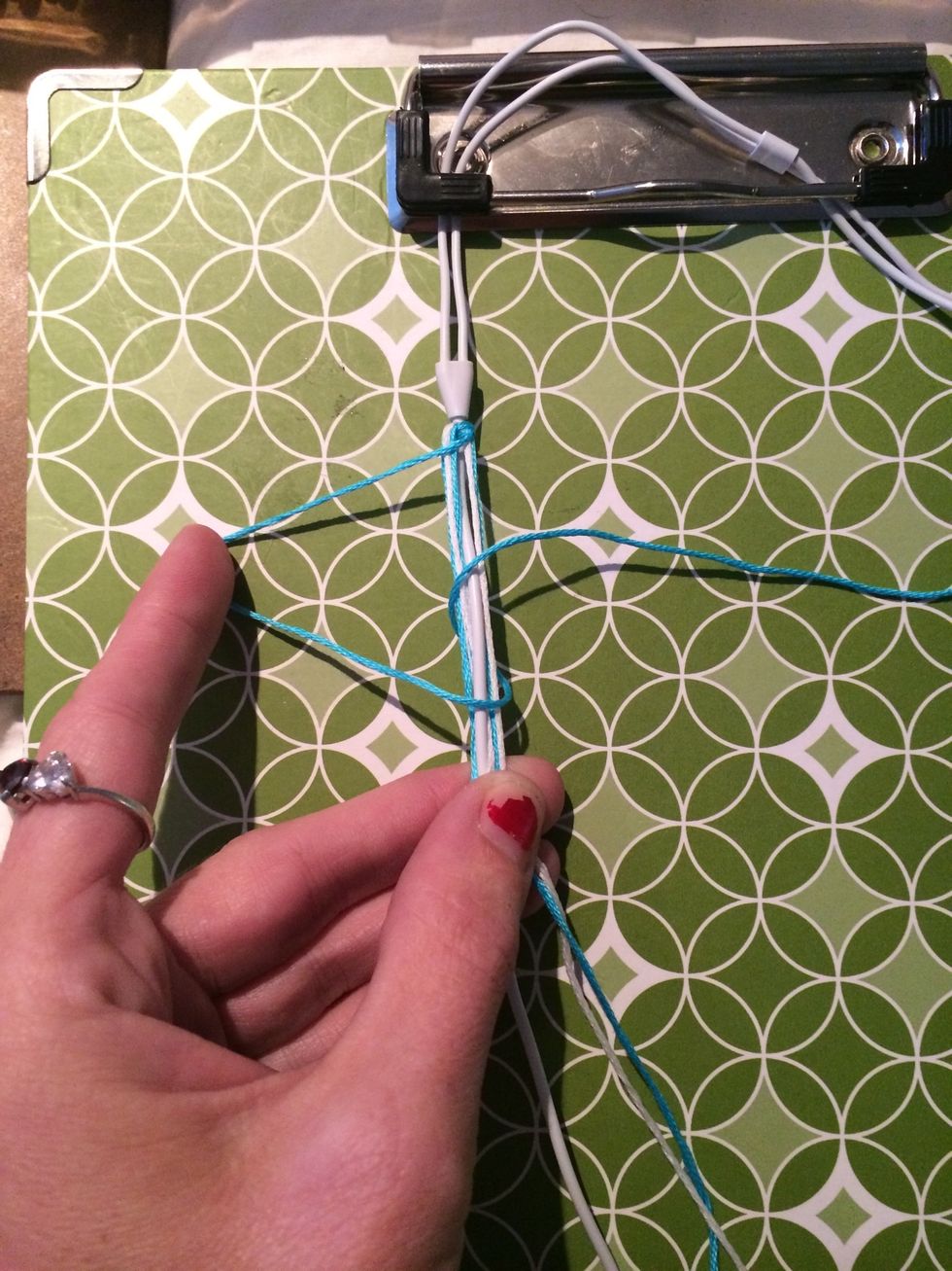 Put your bobbin under the cord and through the loop of the 4.