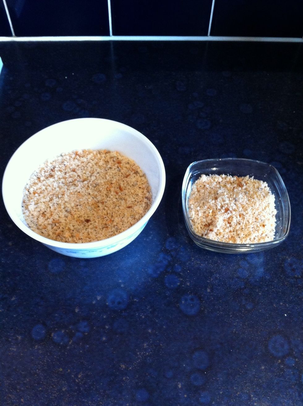 Put your breadcrumbs into a medium sized bowl leaving about 3 table spoons aside in another smaller bowl for use later